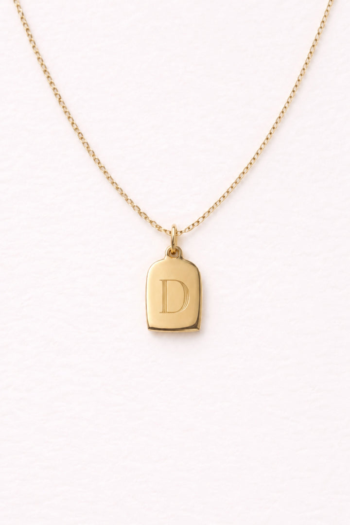 Caden Lane gold necklace with engraved initial "D" tag charm pendant