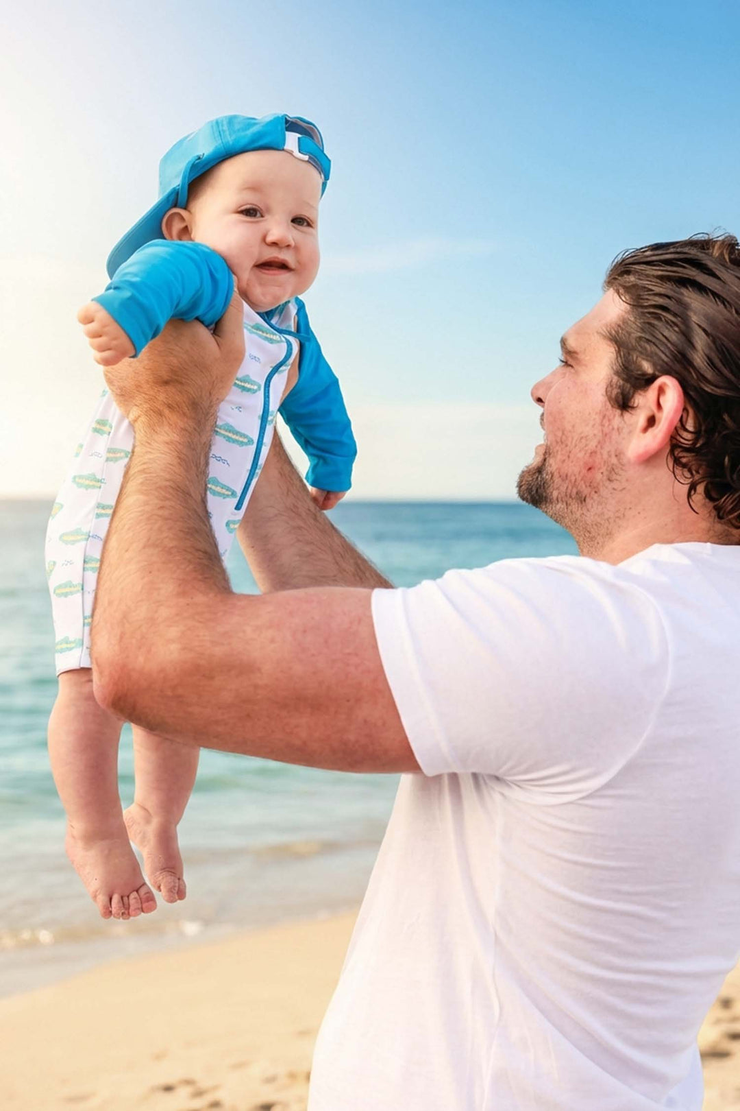 tiny trout father and son matching swimsuits 