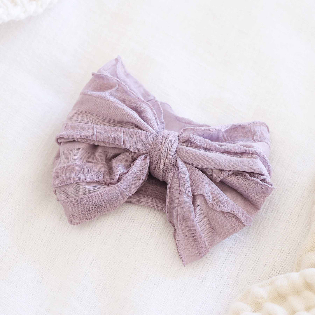 amethyst large ruffle knit bow for babies 