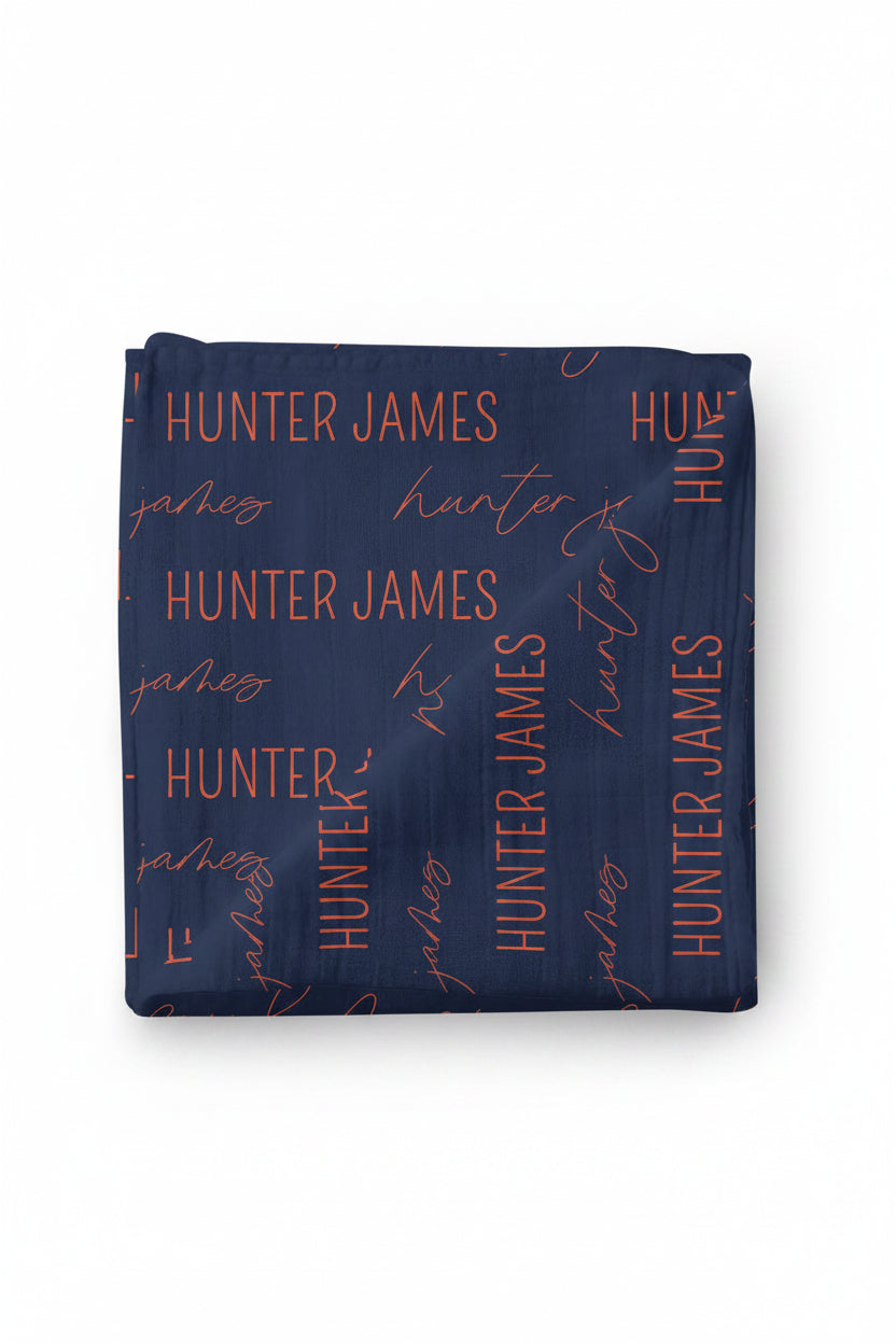navy and orange personalized swaddle blanket 
