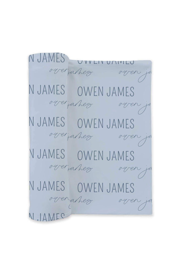baby blue personalized swaddle blanket in block and script font