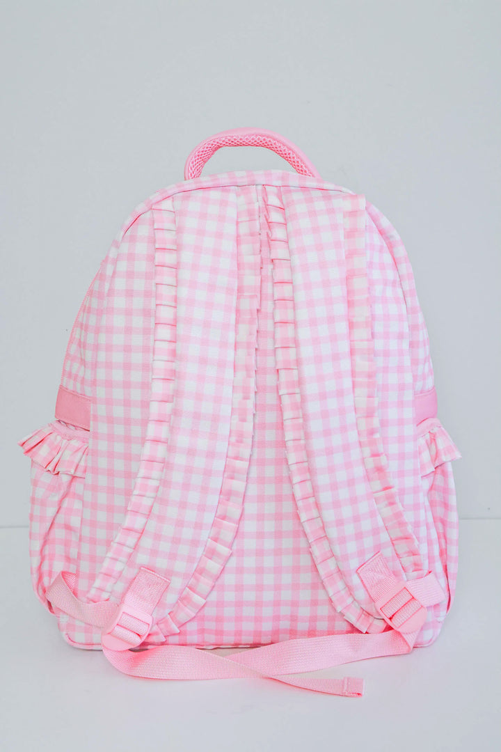 view of straps on pink gingham backpack 