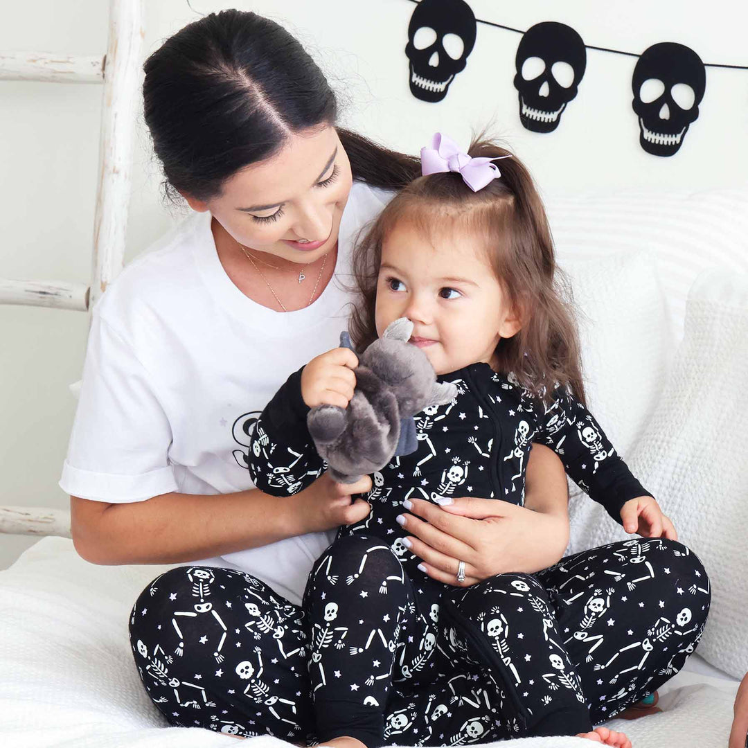 black and white skeleton pajama romper for kids 