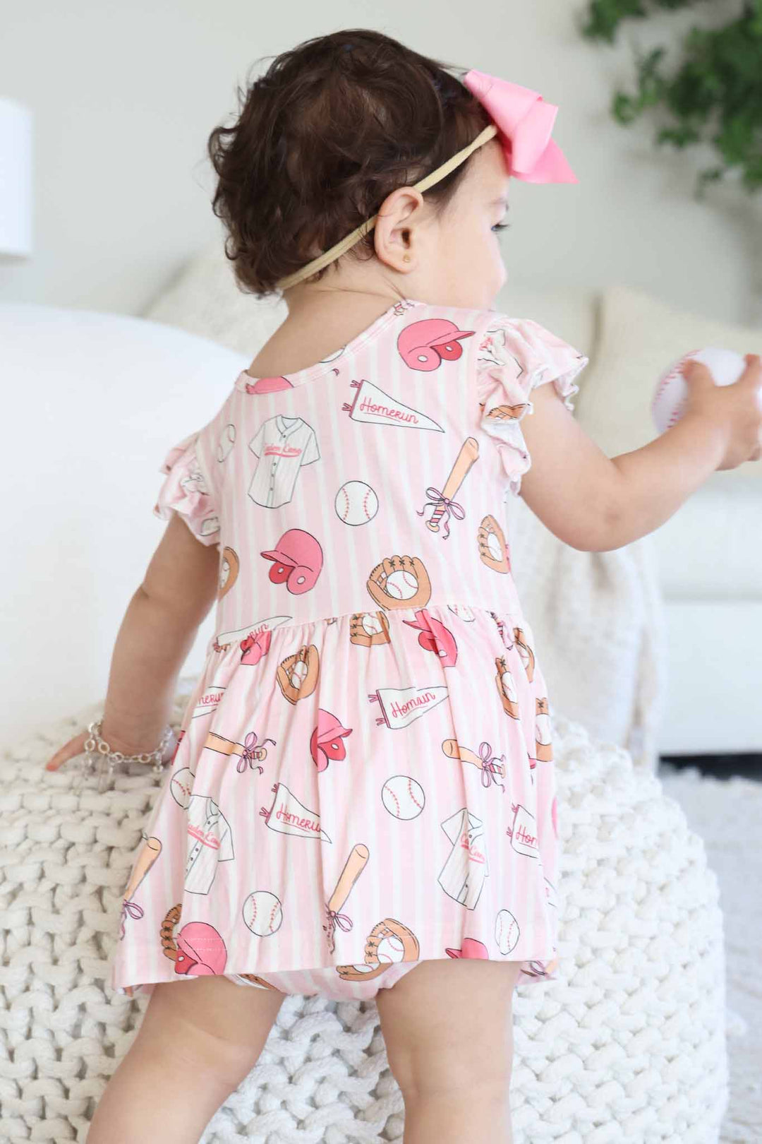 back view of ballpark babes ruffle skirt bodysuit 