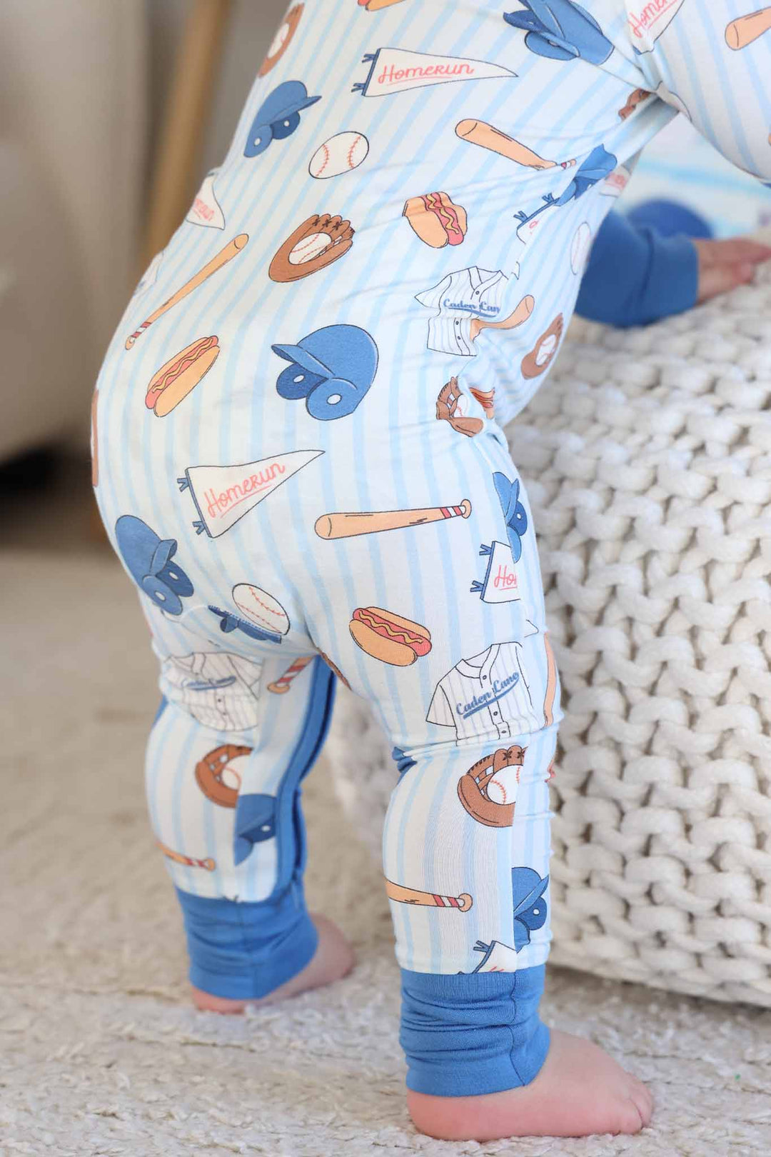 back view of ballpark bros convertible zip romper pajama for boys 