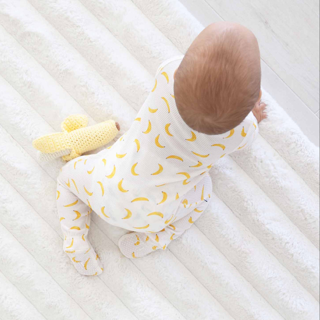 tan and yellow banana zipper footie for babies 