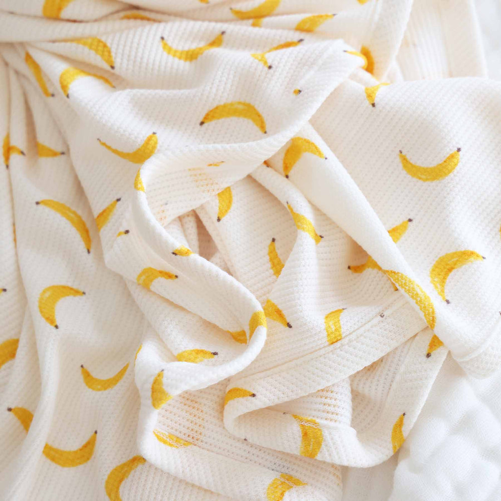 off white oversized bamboo swaddle blanket with bananas 
