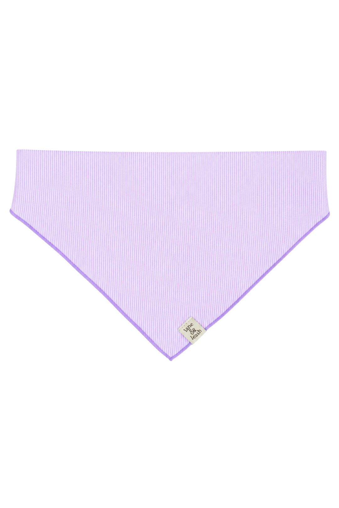 Flat lay of a solid lavender pet bandana in a triangle shape with lavender purple border, showing the blank embroidery area before personalization