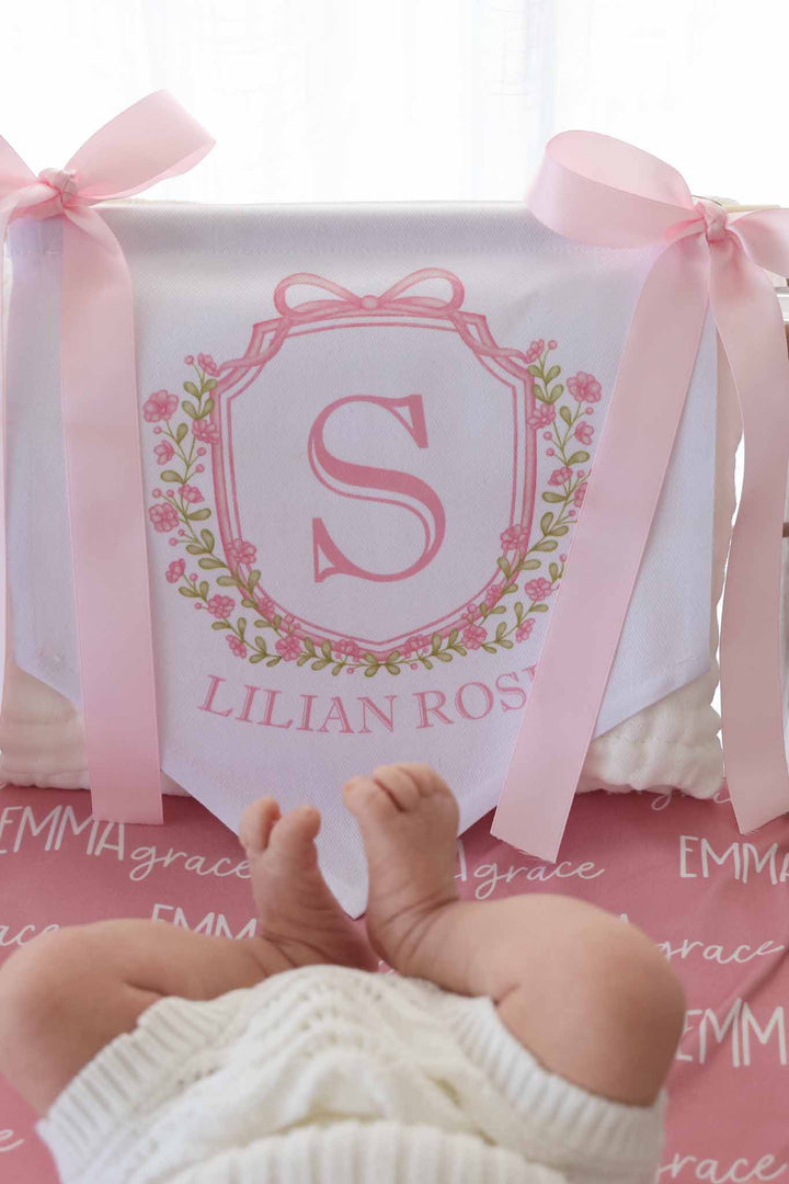 pink welcome banner name announcement for newborn girls 