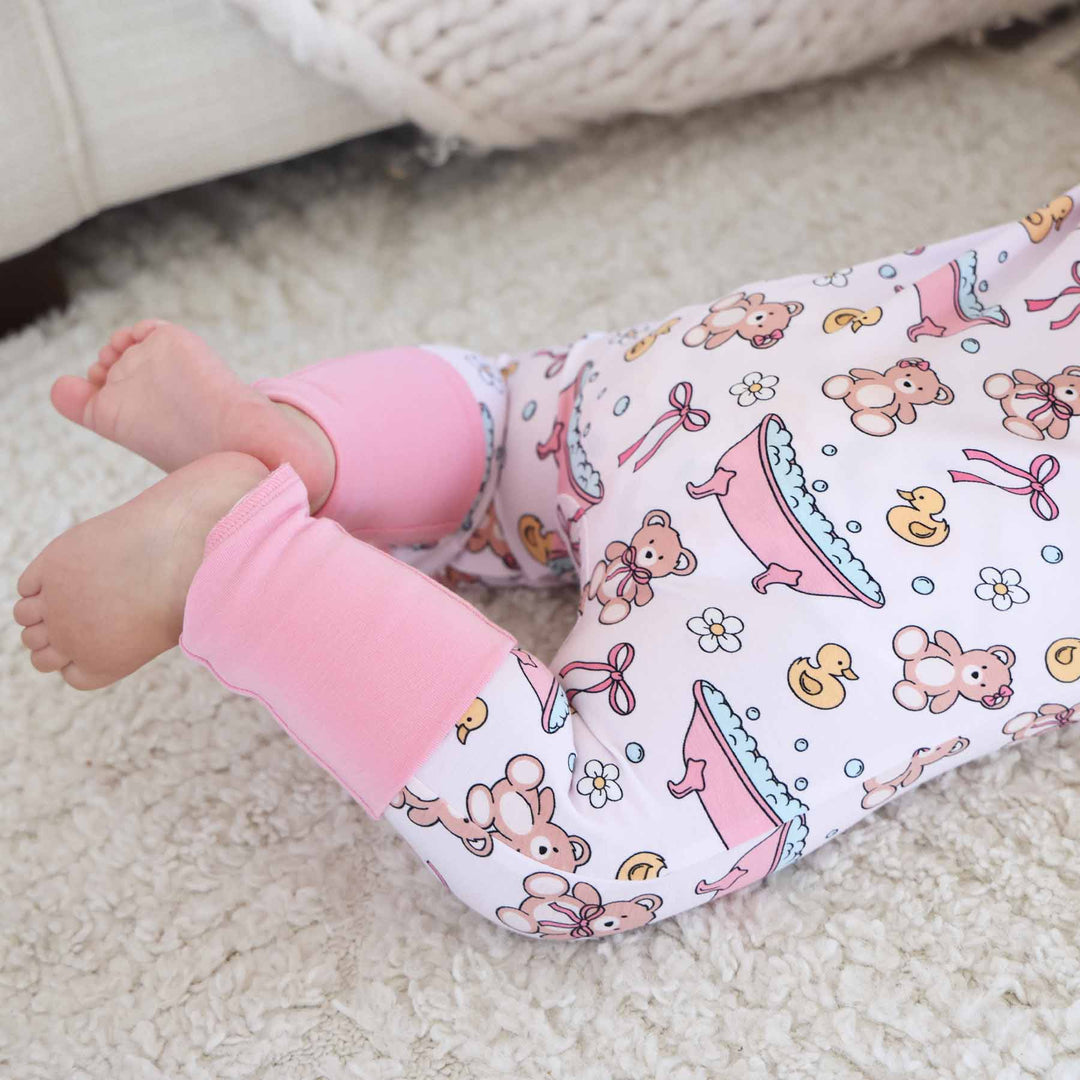 baby zip romper with flip mitts and footies pink bathtime besties 