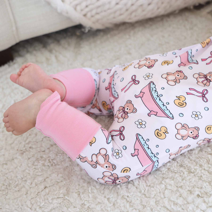 baby zip romper with flip mitts and footies pink bathtime besties 