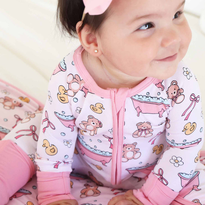 bathtime besties pink convertible zip romper pajama for babies and toddlers 