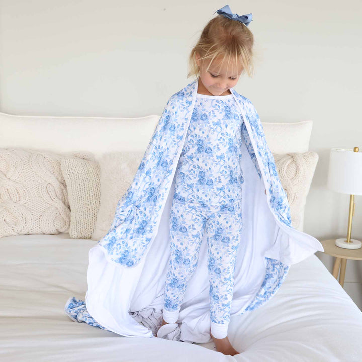 blue and white floral and bow bamboo blanket for kids 