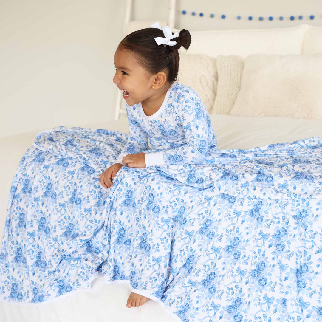 betsy's blooms blue and white rose and bow double sided bamboo blanket 