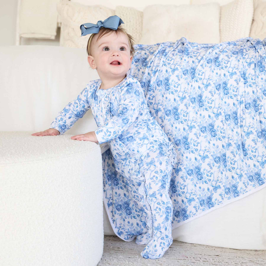 blue floral long ruffle zipper footie for newborn and baby girls 