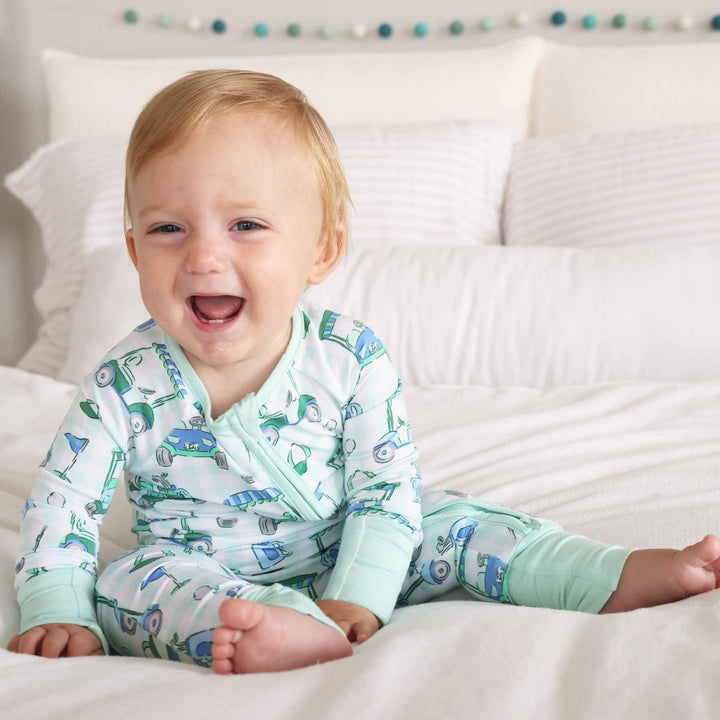 blue and green golf roper pajama for babies and toddlers 