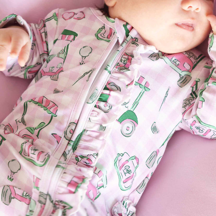 pink golf footie for girls with ruffles 