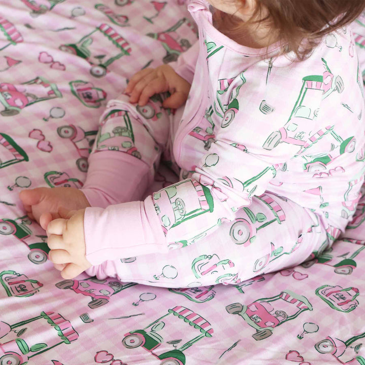 birdie babes pink convertible zip pajama romper for babies and toddlers 