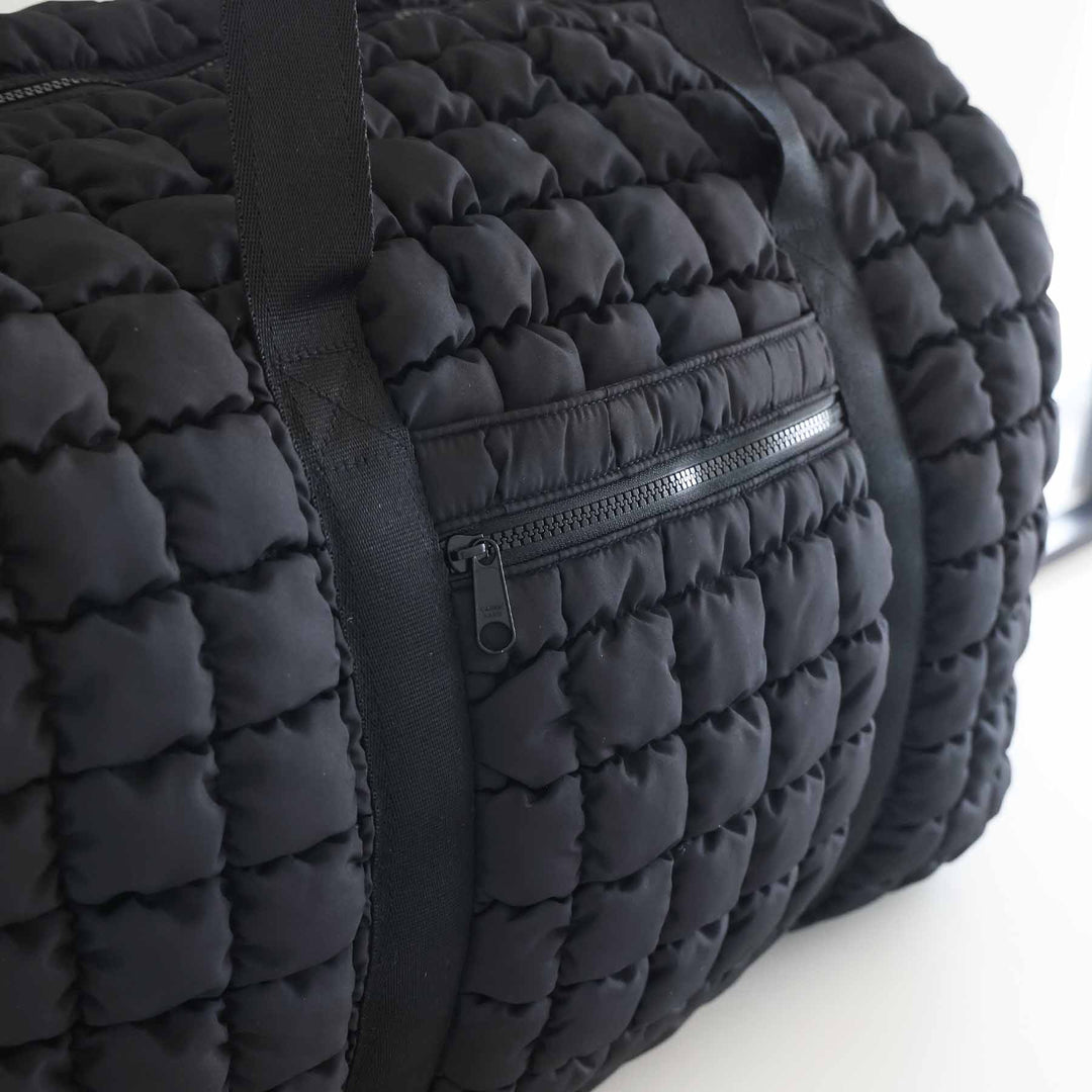 black quilted weekender bag for women with side pocket 