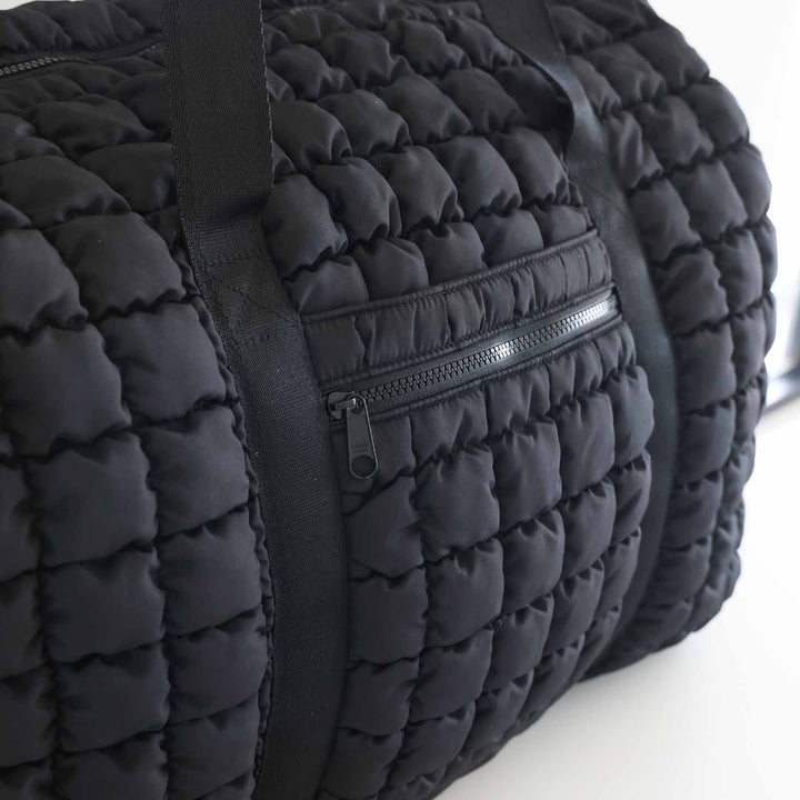 black quilted weekender bag for women with side pocket 