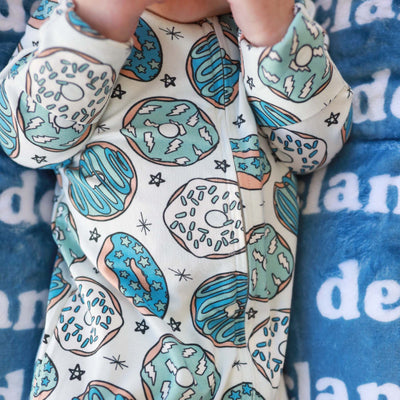 zipper footie pajama for baby with blue donuts 