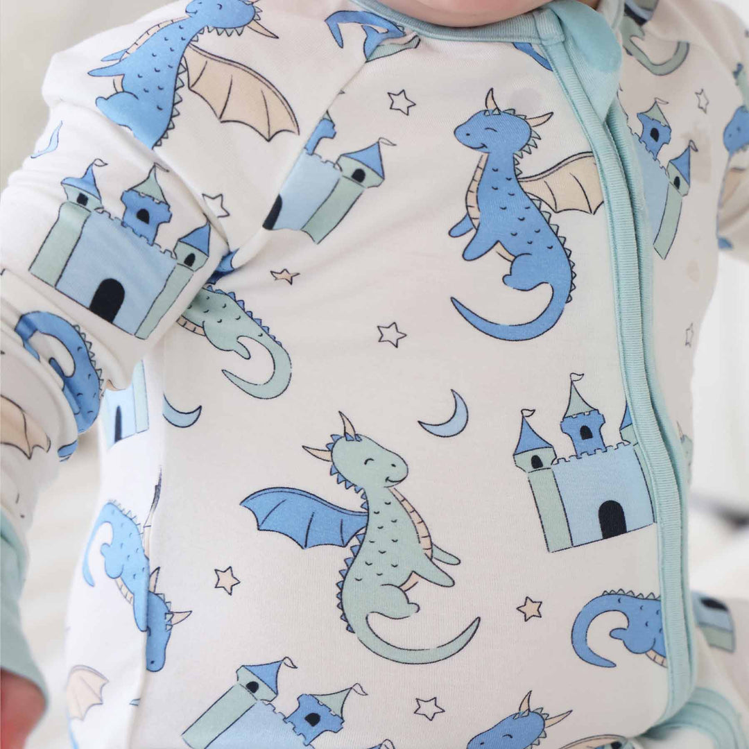 Baby boy wearing fantasy castle and dragon convertible romper