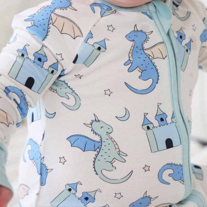 Baby boy wearing fantasy castle and dragon convertible romper