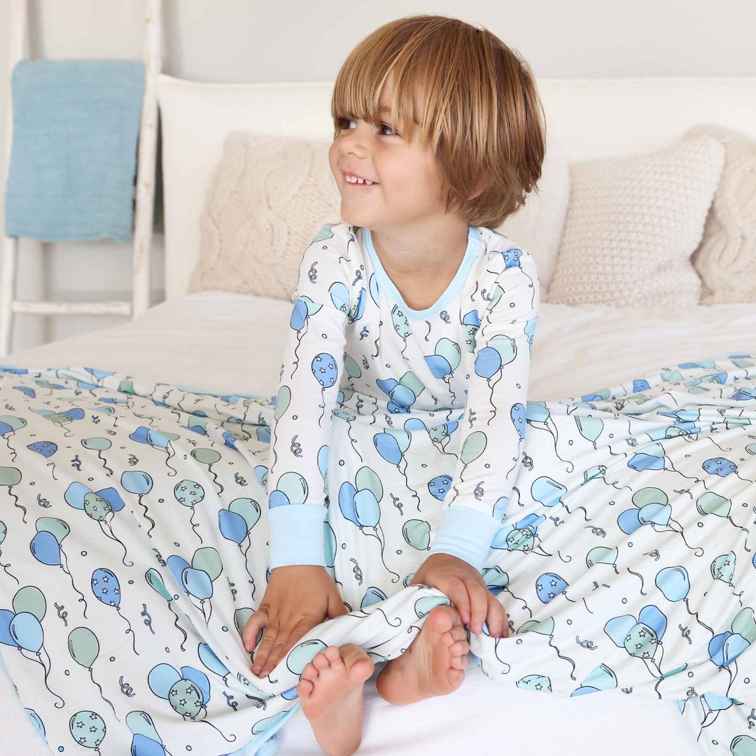 blue party time double sided bamboo blanket for boys with matching pajamas 