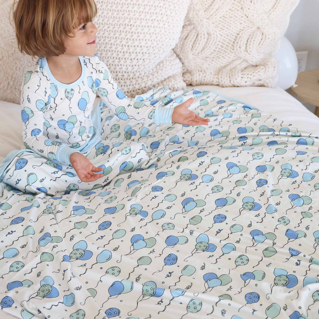 blue and green balloon and streamer birthday blanket for boys 