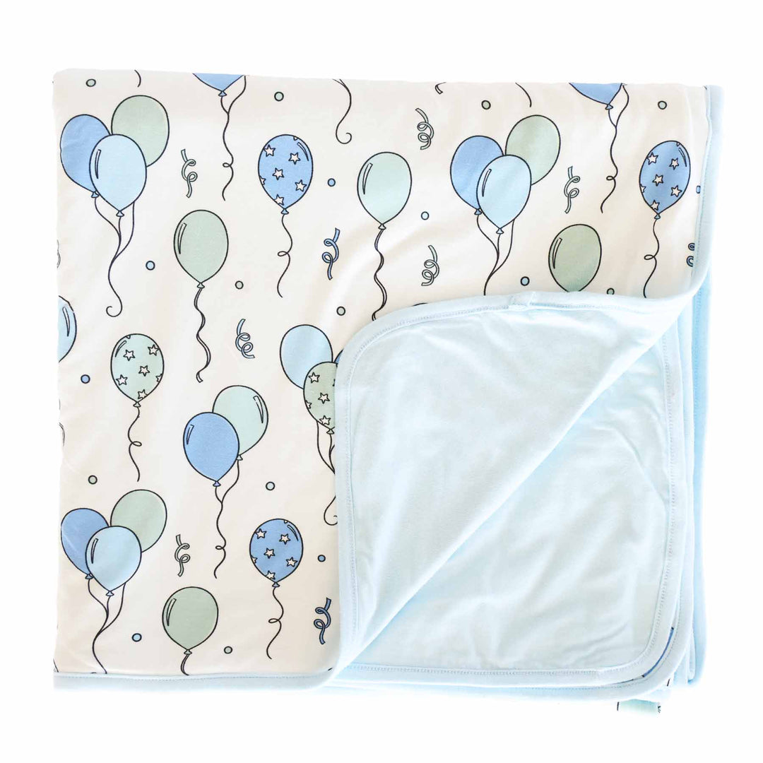 blue and green balloon and streamer double sided bamboo blanket 