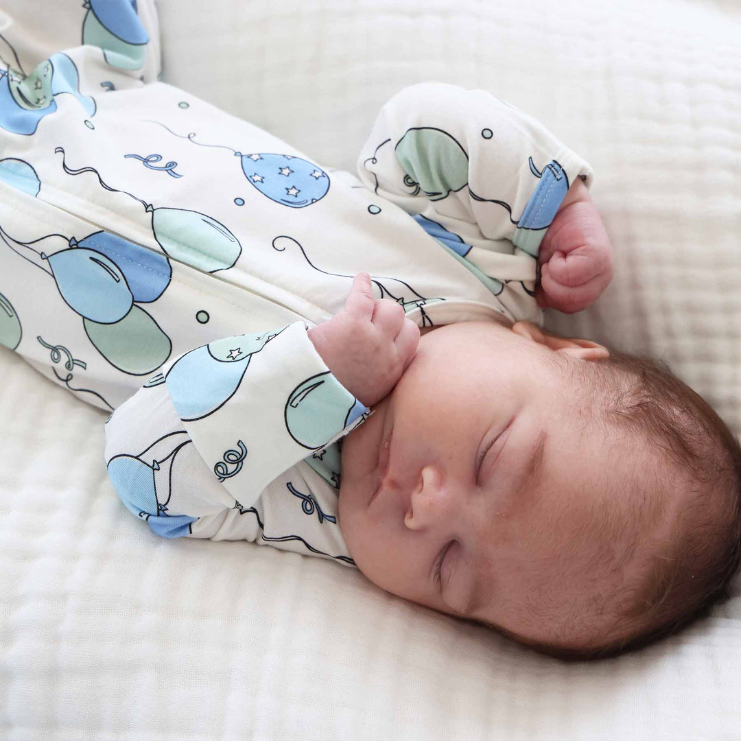 baby boy zipper footie pajama with balloons and streamers 