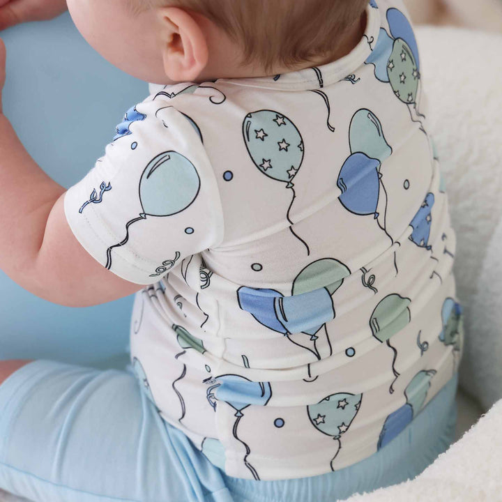 short sleeve shirt with blue and green balloons with matching light blue shorts 