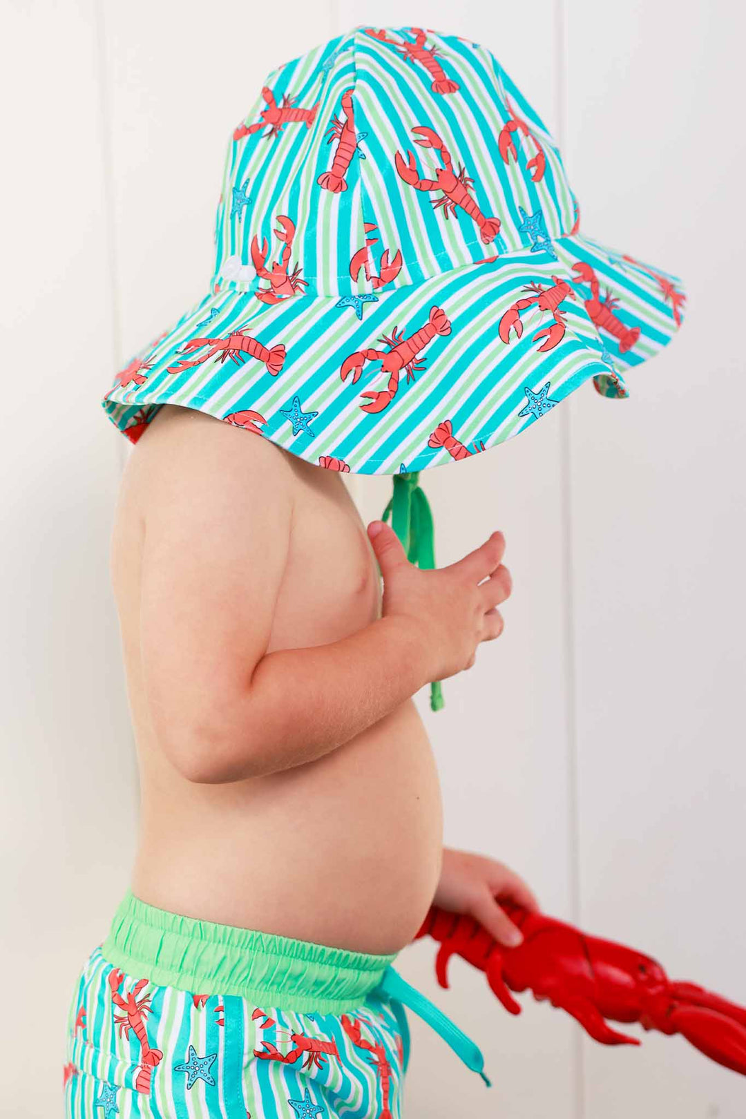 blue and green stripes sun hat for kids with lobsters