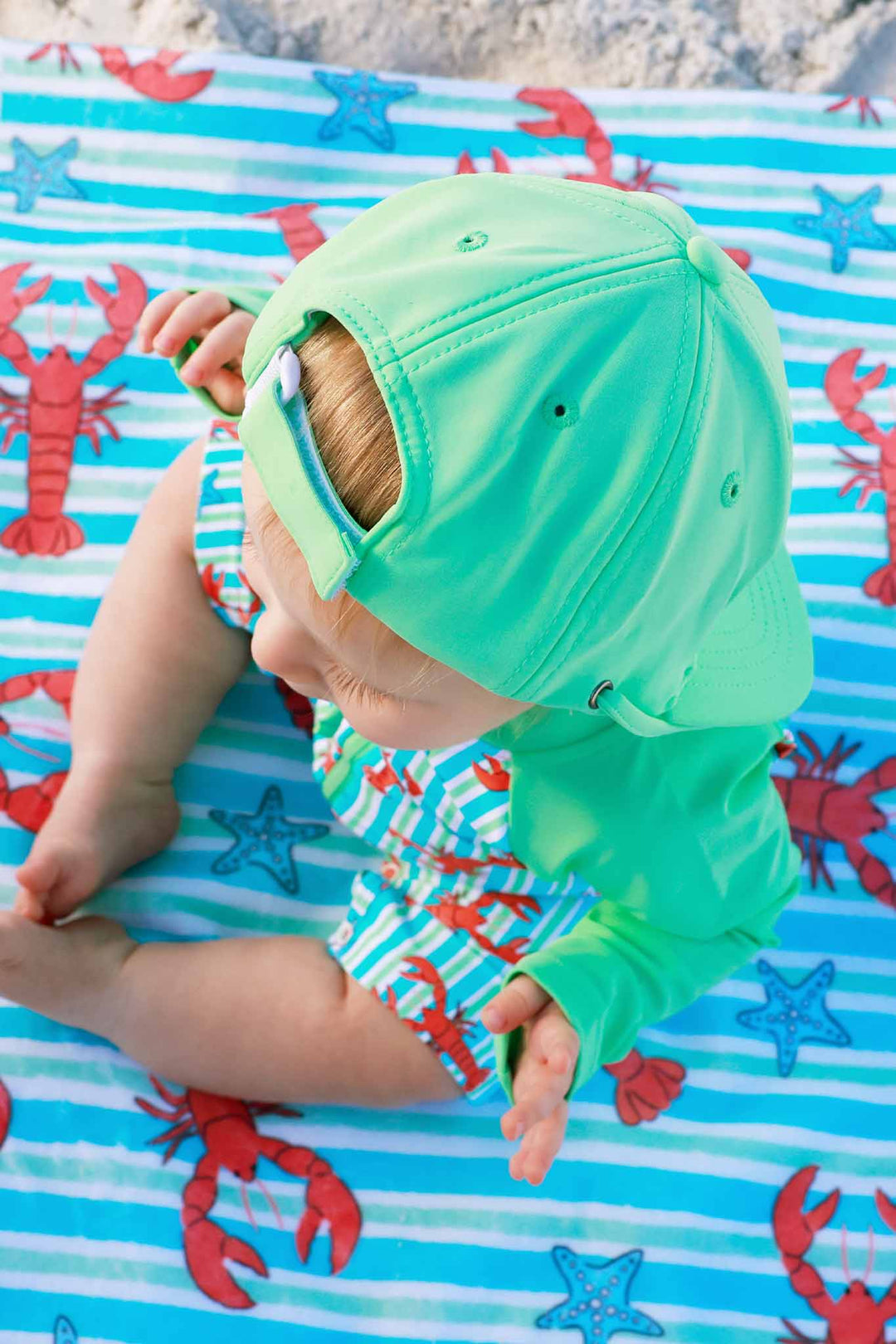 closeup of bright green surf hat for boys 
