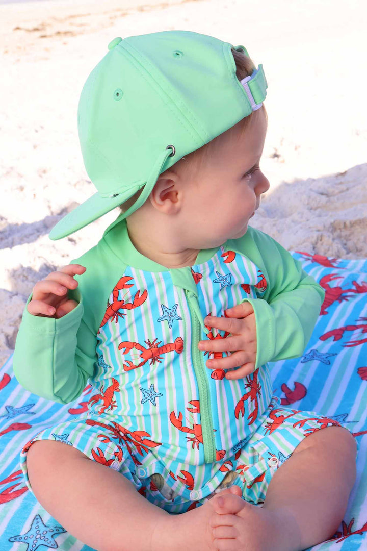 side view of pinch me adjustable surf hat 