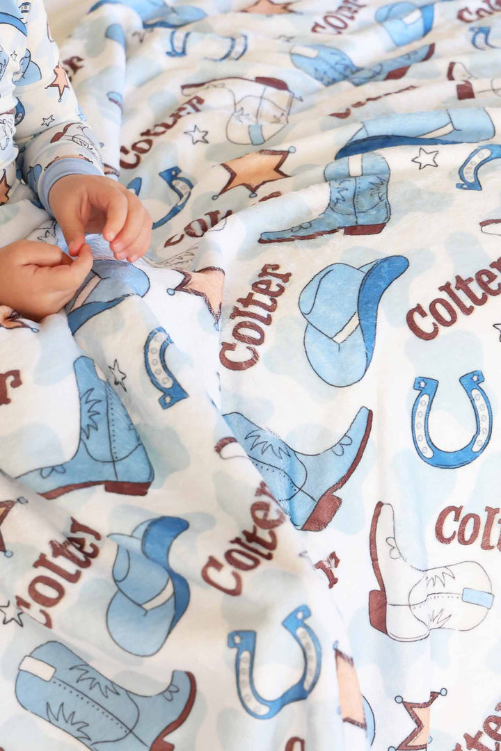 blue cowboy boot, hat and horseshoe personalized blanket for boys 