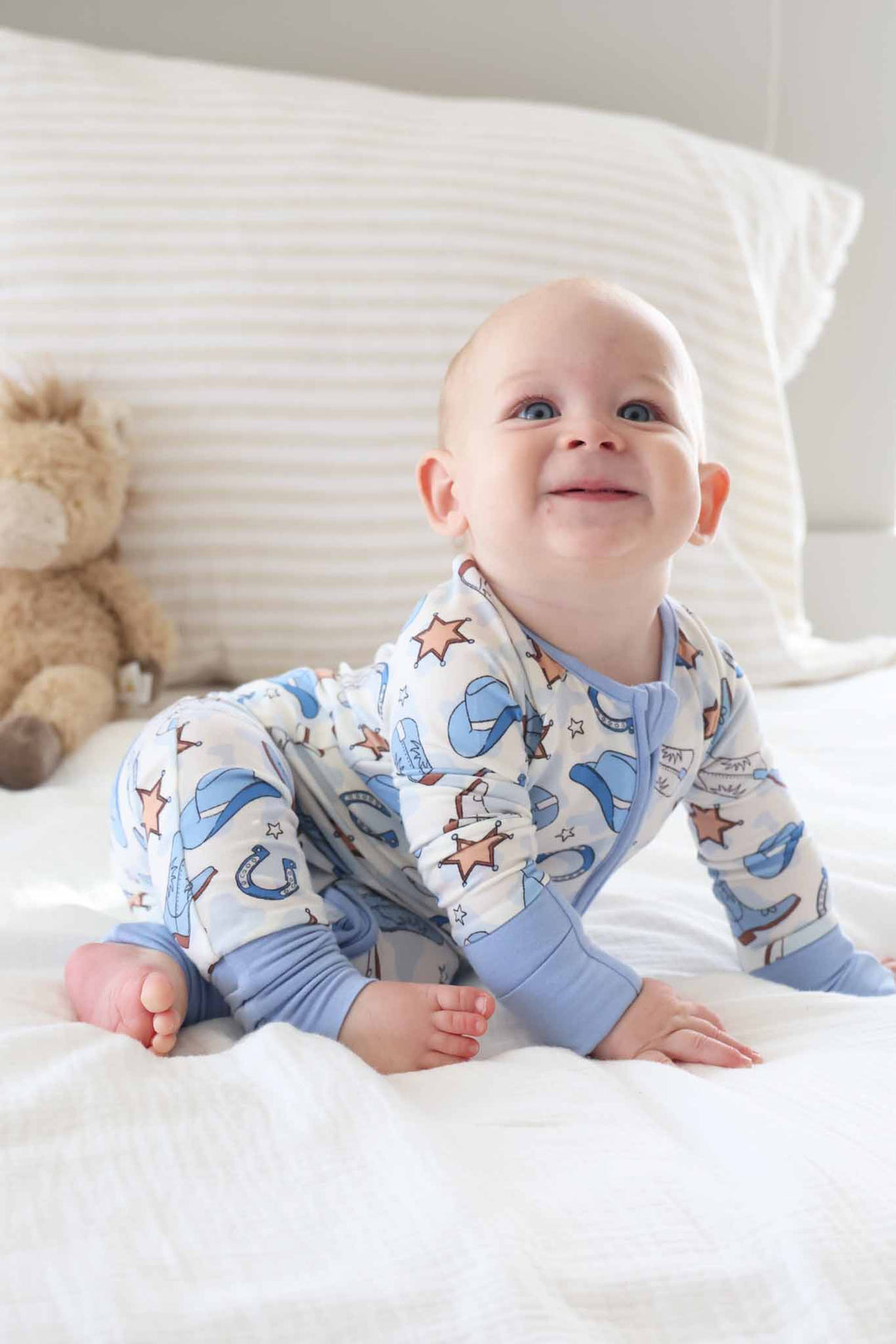 blue western themed zip romper pajama for baby and toddler boys 