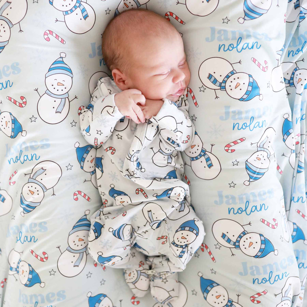 baby boy christmas swaddle personalized with name blue snowmen with candy canes