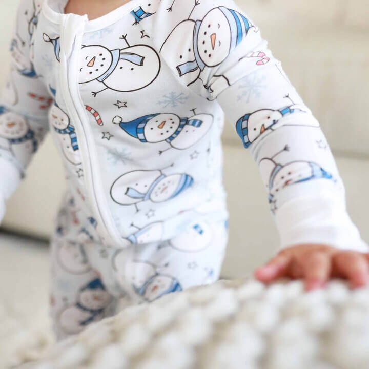 blue snowman christmas romper pajama for babies and toddlers