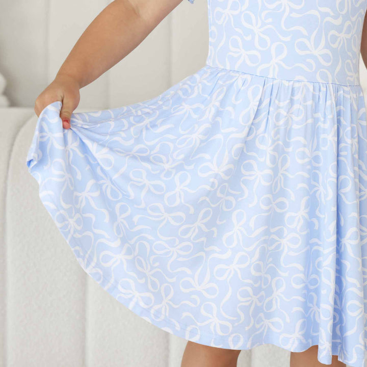 mid-length dress for girls light blue with white bows
