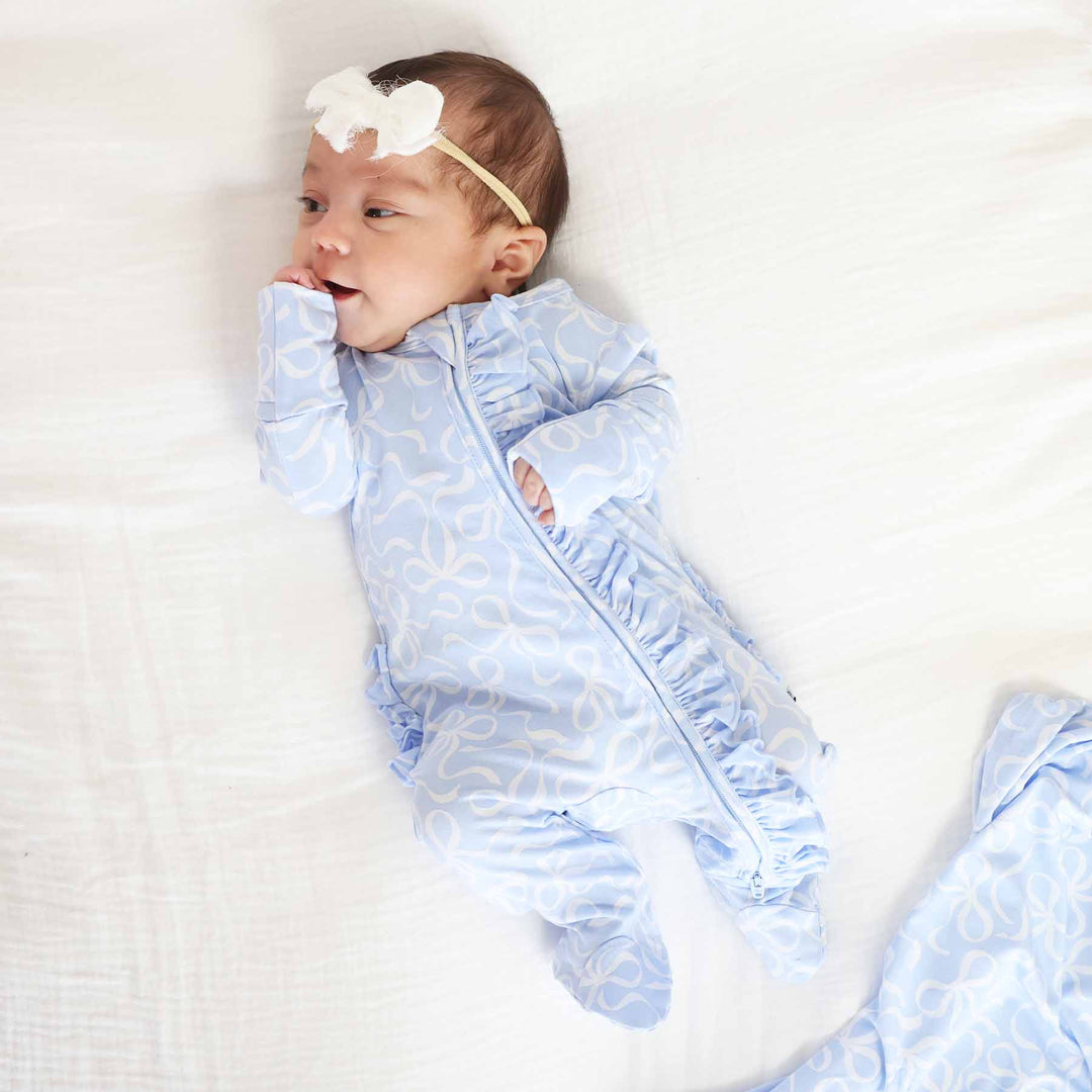 blue and white bow footie with ruffles