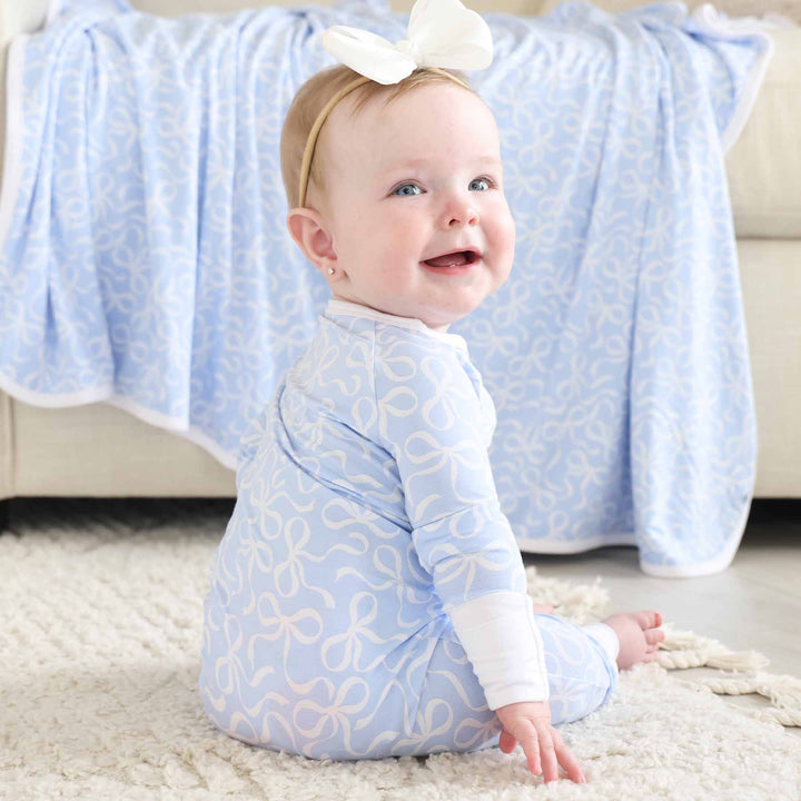 light blue bamboo blanket with white bows for girls 