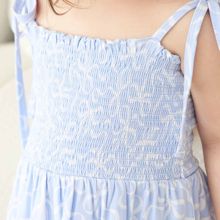 smocked skirt bodysuit for babies and toddlers blue-tiful bows 