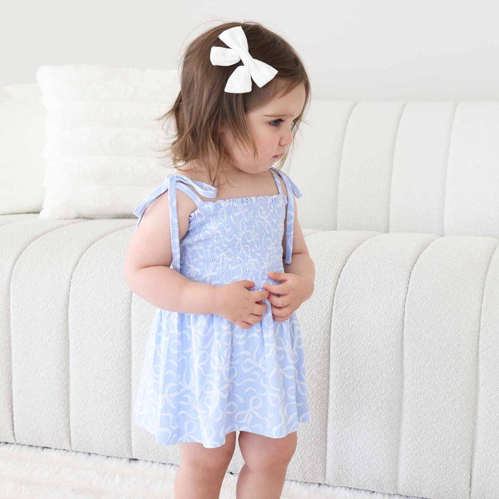 spaghetti strap bow tie shoulder smocked bodysuit with bows 