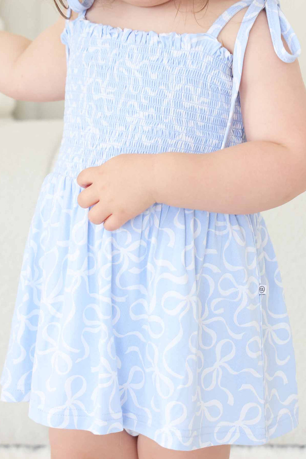 blue-tiful bows smocked bodysuit 