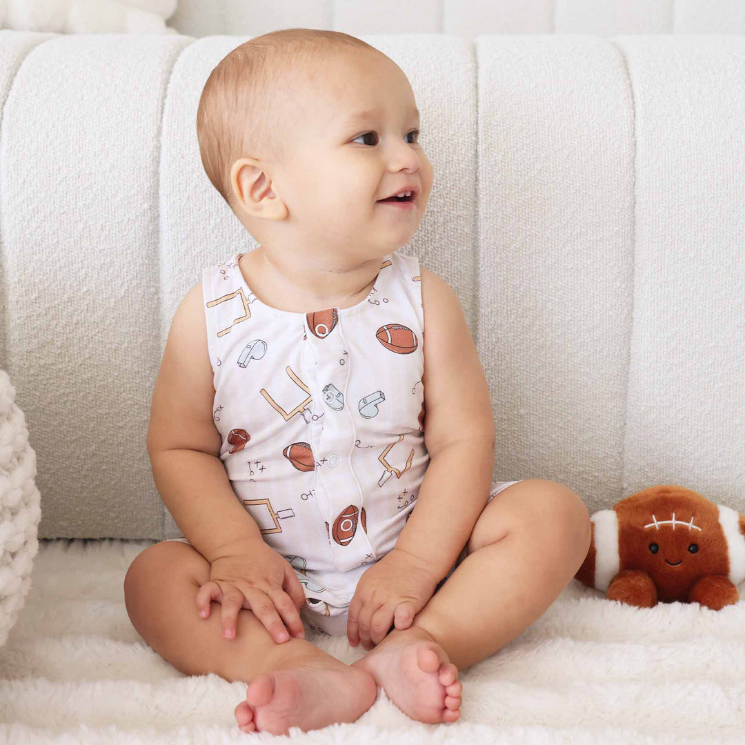 blue tiny touchdown sleeveless snap romper for baby and toddler boys 