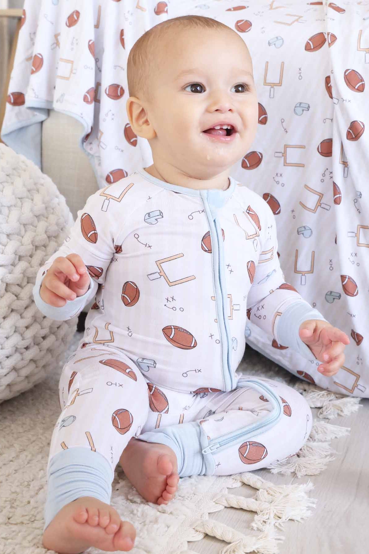 blue tiny touchdowns convertible zip romper pajama for babies and toddlers 