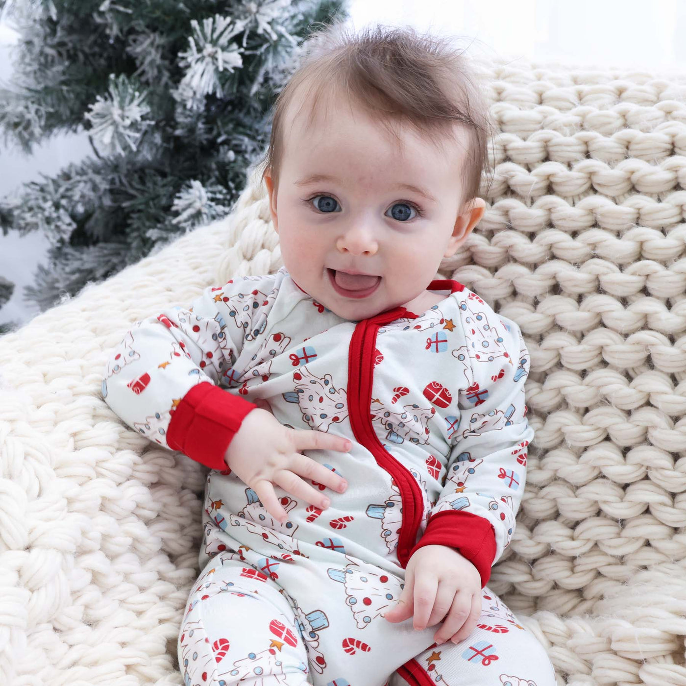 baby christmas pajamas blue with christmas trees, candy canes and presents 