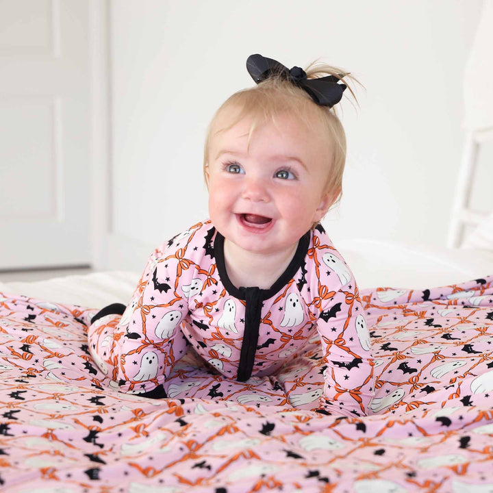 pink, orange, black and white girly halloween zip romper pajama for baby and toddler girls 