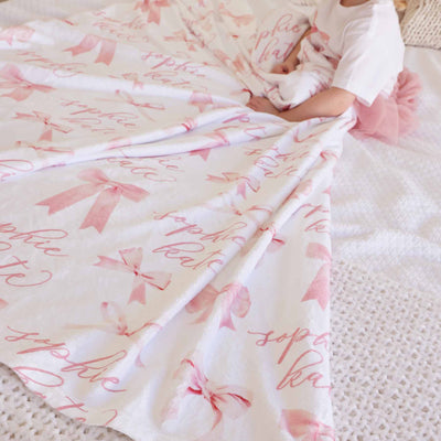 white personalized blanket for kids with bows 